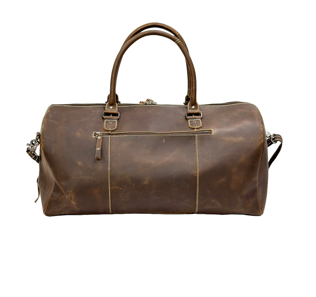 Brown leather duffel bag on a white background