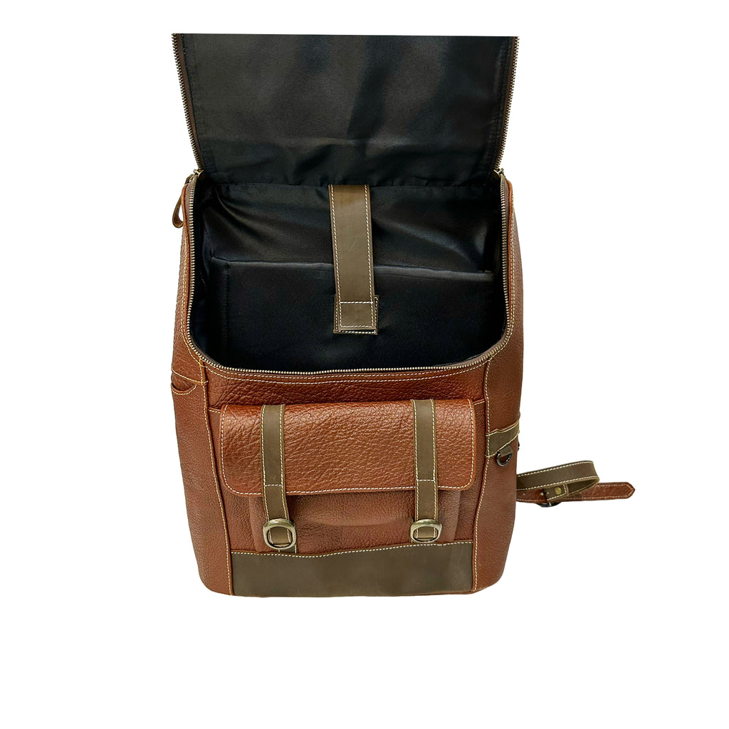 Brown leather backpack with gold accents on a white background