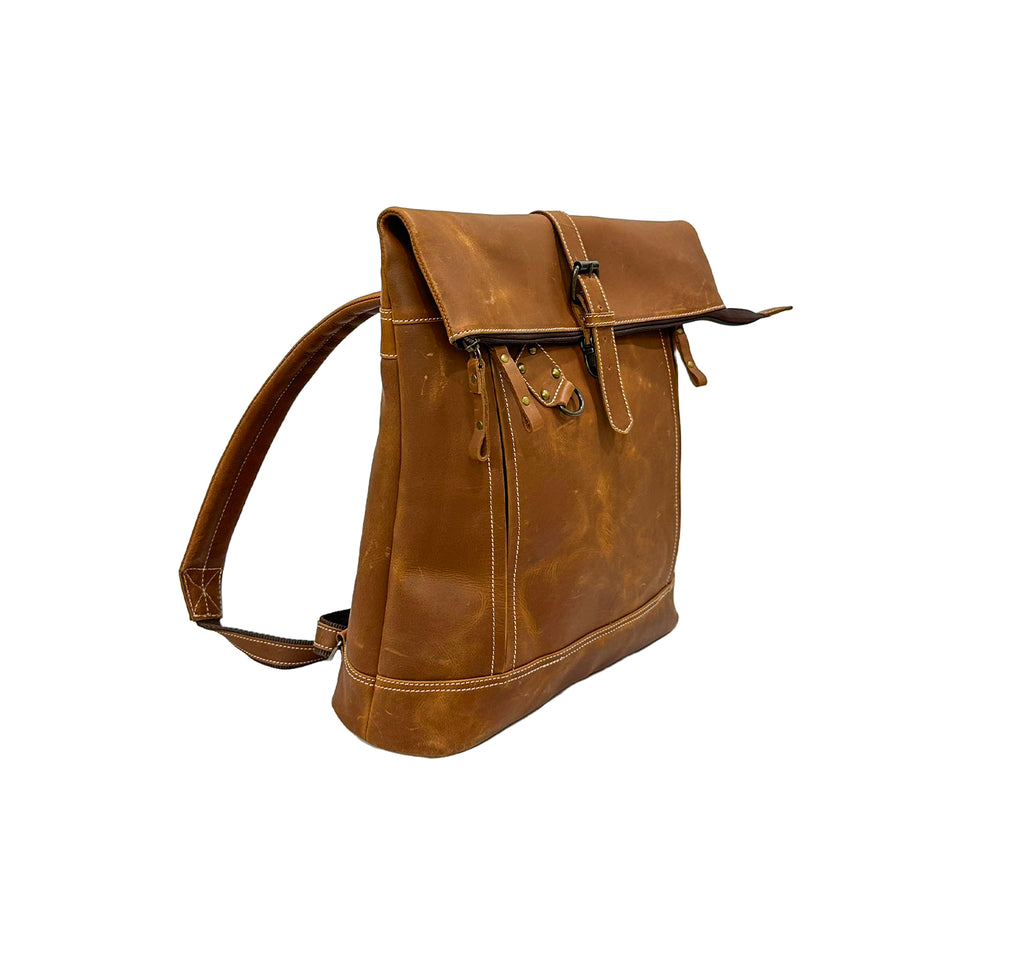 Brown leather backpack on a white background